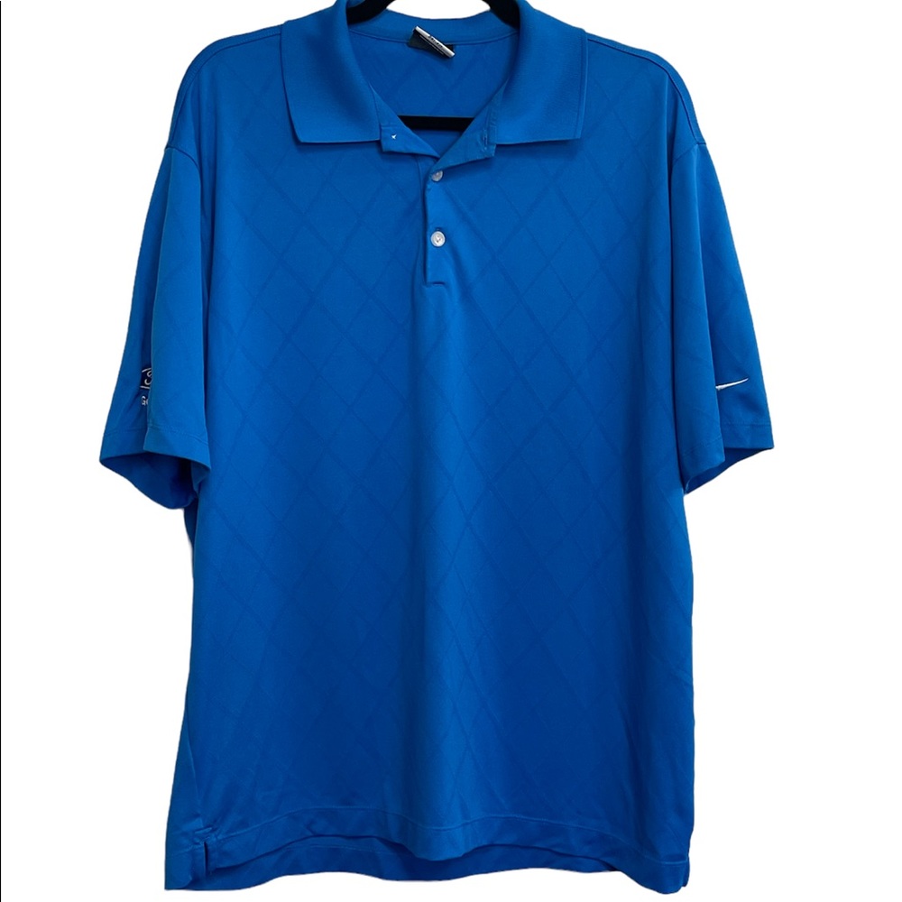 Nike Golf Dri-Fit royal blue short-sleeve polo with Ford embroidery on s…